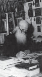 St. Justin at his desk